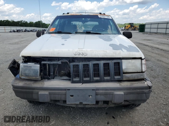 1995 Jeep Grand Cherokee Laredo с VIN 1J4GZ58S5SC724222, выставлен на аукционе Copart как лот 57837155 с пробегом 246 303 миль миль и Списание • Salvage title. История ставок и продаж доступна на DreamBid. Изображение 5.
