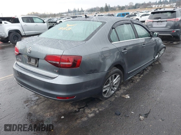 2017 Volkswagen Jetta SEL with VIN 3VWL17AJ1HM211546, listed as a IAAI auction lot 41502402 with 52,030 mi miles and . Bid and sale history available at DreamBid. Image 4.