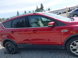 2015 Ford Escape Titanium with VIN 1FMCU9J93FUB28037, listed as a IAAI auction lot 42432345 with 133,242 mi miles and . Bid and sale history available at DreamBid. Image 13.