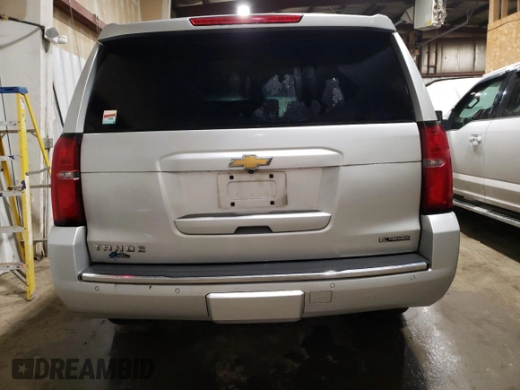2018 Chevrolet Tahoe Premier with VIN 1GNSKCKCXJR160533, listed as a Copart auction lot 55648025 with 102,243 mi miles and Salvage title. Bid and sale history available at DreamBid. Image 6.
