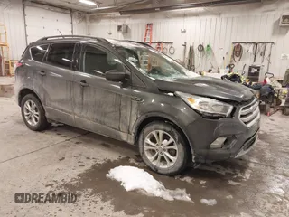 2018 Ford Escape SE with VIN 1FMCU9GD8JUA53114, listed as a IAAI auction lot 41592808 with 167,659 mi miles. Bid and sale history available at carsss.com. Image 1.