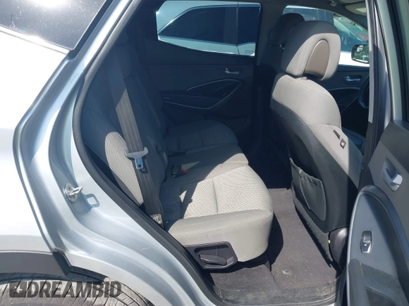 2018 Hyundai Santa Fe 2.4L z VIN 5XYZTDLB9JG513584, wystawiony jako IAAI lot #42031291 z przebiegiem 131 109 mil mil oraz . Historia ofert i sprzedaży dostępna na DreamBid. Obrazek 8.