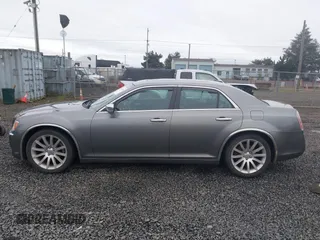 2011 Chrysler 300 with VIN 2C3CA6CT8BH547555, listed as a IAAI auction lot 41858626 with 141,853 mi miles. Bid and sale history available at carsss.com. Image 14.