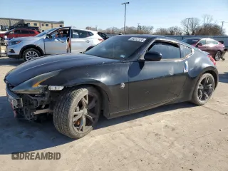 2009 Nissan 370Z Touring with VIN JN1AZ44E19M402450, listed as a Copart auction lot 84212124 with 153,236 mi miles and Clean Title. Bid and sale history available at carsss.com. Image 1.