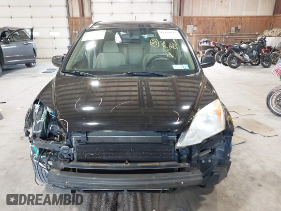 2007 Honda CR-V EX z VIN JHLRE48567C062496, wystawiony jako IAAI lot #42198115 z przebiegiem 225 559 mil mil oraz . Historia ofert i sprzedaży dostępna na DreamBid. Obrazek 12.