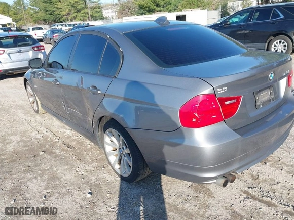 2011 BMW 3 Series 328i with VIN WBAPH5G5XBNM75907, listed as a IAAI auction lot 42002821 with 204,122 mi miles. Bid and sale history available at carsss.com. Image 3.