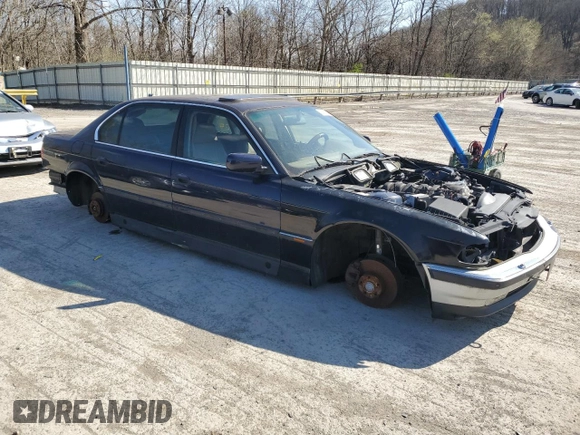 1996 BMW 7 Series 740iL z VIN WBAGJ8328TDL35931, wystawiony jako Copart lot #52402765 z przebiegiem Nie podano mil oraz Czysty tytuł • Clean title. Historia ofert i sprzedaży dostępna na DreamBid. Obrazek 4.
