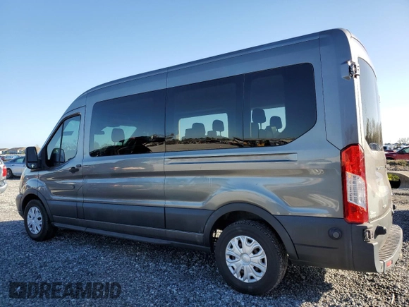 2015 Ford Transit Passenger XL with VIN 1FBAX2CGXFKA15126, listed as a Copart auction lot 84225534 with 134,178 mi miles and Salvage title. Bid and sale history available at DreamBid. Image 2.