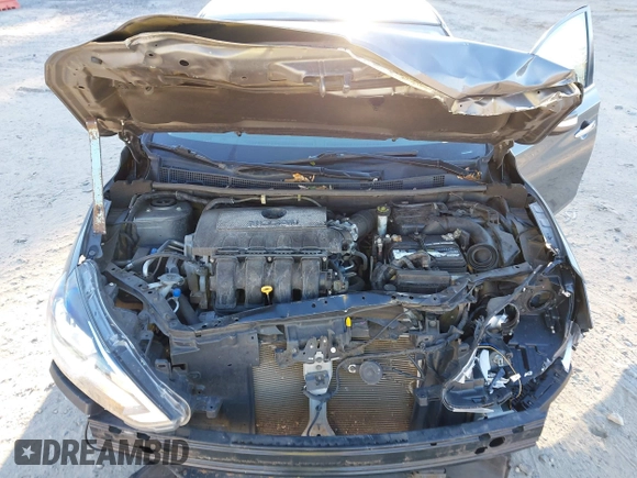 2019 Nissan Sentra S z VIN 3N1AB7APXKY265054, wystawiony jako IAAI lot #40929593 z przebiegiem 75 298 mil mil oraz . Historia ofert i sprzedaży dostępna na DreamBid. Obrazek 10.