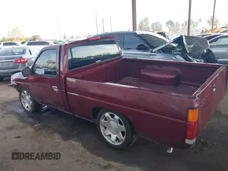 1994 Nissan Frontier z VIN 1N6SD11S8RC306682, wystawiony jako IAAI lot #41725950 z przebiegiem 169 022 mil mil oraz . Historia ofert i sprzedaży dostępna na DreamBid. Obrazek 14.