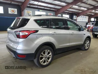 2018 Ford Escape SE z VIN 1FMCU9GD9JUA77812, wystawiony jako Copart lot #57847175 z przebiegiem 106 898 mil mil oraz Czysty tytuł • Clean title. Historia ofert i sprzedaży dostępna na DreamBid. Obrazek 3.