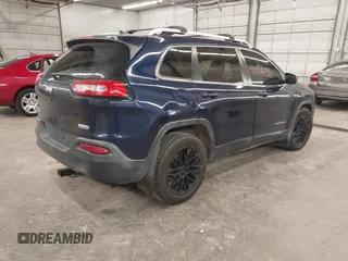 2014 Jeep Cherokee Latitude with VIN 1C4PJMCS9EW190255, listed as a IAAI auction lot 41956155 with 220,265 mi miles. Bid and sale history available at carsss.com. Image 4.