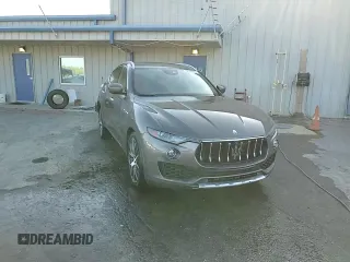 2017 Maserati Levante S z VIN ZN661YUS1HX225966, wystawiony jako Copart lot #52089285 z przebiegiem 118 690 mil mil oraz Szkoda całkowita • Salvage title. Historia ofert i sprzedaży dostępna na DreamBid. Obrazek 13.