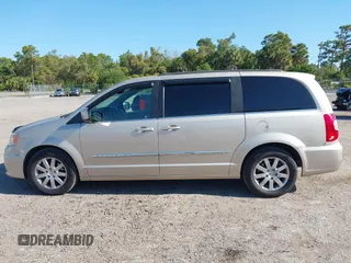 2014 Chrysler Town & Country Touring with VIN 2C4RC1BG4ER372629, listed as a IAAI auction lot 42060762 with 180,662 mi miles. Bid and sale history available at carsss.com. Image 14.