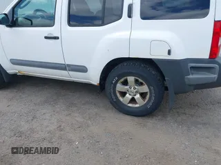 2011 Nissan Xterra S with VIN 5N1AN0NW2BC516828, listed as a IAAI auction lot 42251064 with 212,470 mi miles and . Bid and sale history available at DreamBid. Image 18.