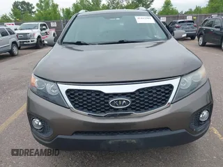 2012 Kia Sorento EX with VIN 5XYKUCA6XCG294104, listed as a IAAI auction lot 42413363 with 57,527 mi miles and . Bid and sale history available at DreamBid. Image 6.
