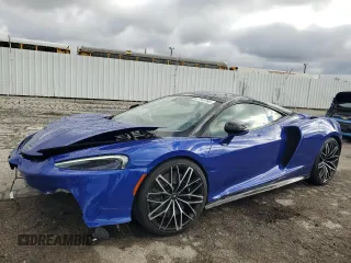 2023 McLaren GT z VIN SBM22GCA9PW003039, wystawiony jako Copart lot #47143765 z przebiegiem 2775 mil mil oraz Szkody całkowita. Historia ofert i sprzedaży dostępna na DreamBid. Obrazek 1.