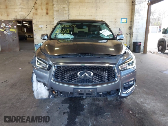 2019 Infiniti QX60 Luxe with VIN 5N1DL0MM8KC558679, listed as a IAAI auction lot 41973649 with 51,867 mi miles and . Bid and sale history available at DreamBid. Image 13.