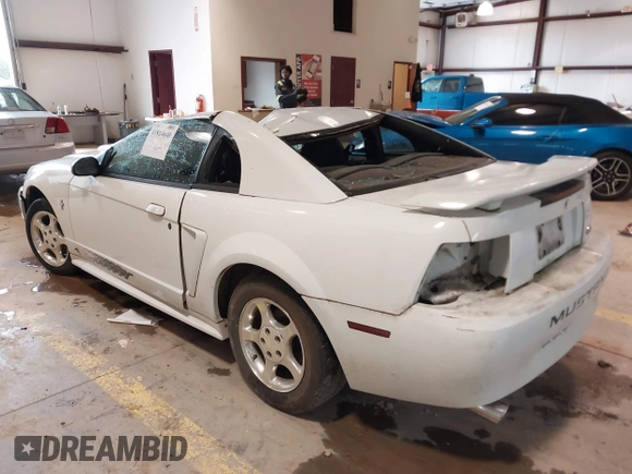 2003 Ford Mustang Standard with VIN 1FAFP40493F381211, listed as a IAAI auction lot 41814640 with 312,991 mi miles. Bid and sale history available at carsss.com. Image 3.