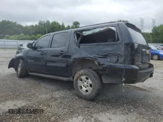2010 Chevrolet Suburban LS with VIN 1GNUKHE35AR236645, listed as a Copart auction lot 61036895 with 237,512 mi miles and Salvage title. Bid and sale history available at DreamBid. Image 2.