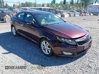 2013 Kia Optima EX z VIN 5XXGN4A70DG132201, wystawiony jako IAAI lot #42449399 z przebiegiem 94 268 mil mil oraz . Historia ofert i sprzedaży dostępna na DreamBid. Obrazek 1.