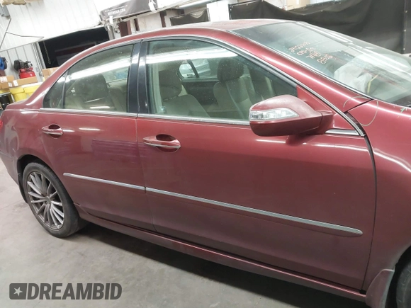 2006 Acura RL z VIN JH4KB16566C008802, wystawiony jako IAAI lot #41457360 z przebiegiem 212 443 mil mil oraz . Historia ofert i sprzedaży dostępna na DreamBid. Obrazek 13.