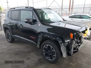 2016 Jeep Renegade Trailhawk with VIN ZACCJBCT0GPD76536, listed as a IAAI auction lot 42341470 with 158,091 mi miles and . Bid and sale history available at DreamBid. Image 1.