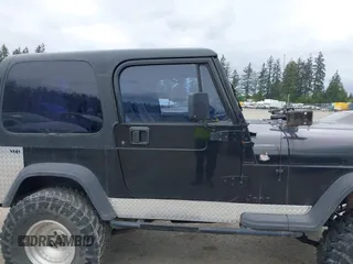 1994 Jeep Wrangler z VIN 1J4FY29S7RP474769, wystawiony jako IAAI lot #42283575 z przebiegiem 154 422 mil mil oraz . Historia ofert i sprzedaży dostępna na DreamBid. Obrazek 13.