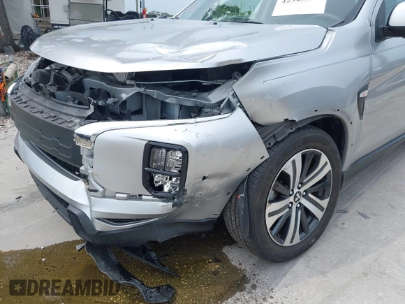 2023 Mitsubishi Outlander ES z VIN JA4ARUAU9PU007786, wystawiony jako IAAI lot #42343050 z przebiegiem 27 507 mil mil oraz . Historia ofert i sprzedaży dostępna na DreamBid. Obrazek 6.