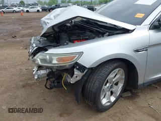2012 Ford Taurus SEL z VIN 1FAHP2EW1CG132855, wystawiony jako IAAI lot #42256022 z przebiegiem 177 749 mil mil oraz . Historia ofert i sprzedaży dostępna na DreamBid. Obrazek 6.