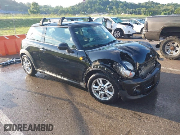 2012 MINI Hardtop with VIN WMWSU3C50CT185690, listed as a IAAI auction lot 42367571 with 63,303 mi miles and . Bid and sale history available at DreamBid. Image 1.