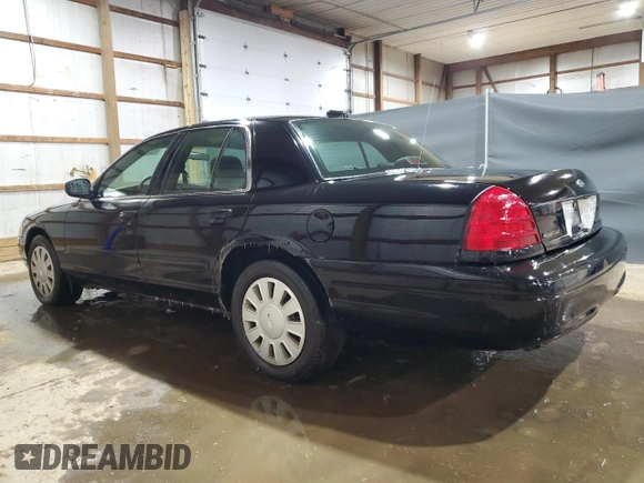 2006 Ford Police Interceptor with VIN 2FAFP71W16X144089, listed as a Copart auction lot 44249135 with 203,859 mi miles and Clean title. Bid and sale history available at DreamBid. Image 2.