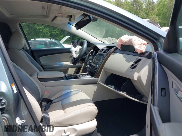 2012 Mazda CX-9 Grand Touring z VIN JM3TB2DA1C0334863, wystawiony jako IAAI lot #42157222 z przebiegiem 277 786 mil mil oraz . Historia ofert i sprzedaży dostępna na DreamBid. Obrazek 5.