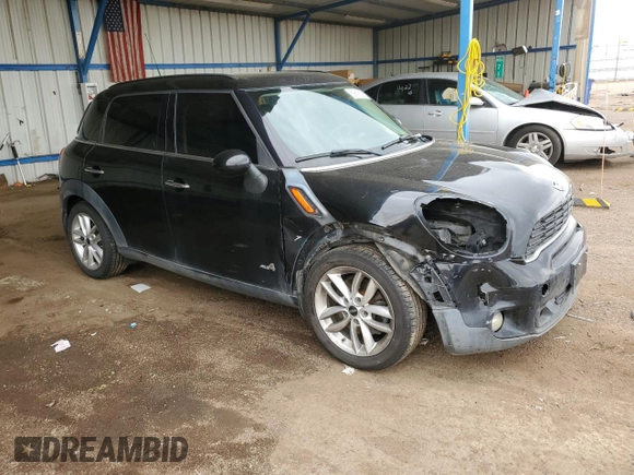 2014 MINI Countryman S with VIN WMWZC5C56EWP38065, listed as a Copart auction lot 59518395 with 91,106 mi miles and Salvage title. Bid and sale history available at DreamBid. Image 4.