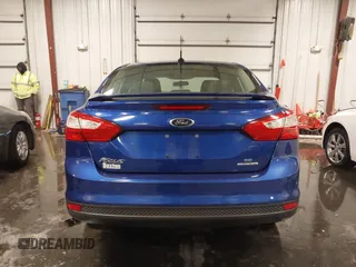 2013 Ford Focus SE z VIN 1FADP3F2XDL124732, wystawiony jako IAAI lot #41510140 z przebiegiem 69 819 mil mil oraz . Historia ofert i sprzedaży dostępna na DreamBid. Obrazek 17.