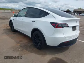 2022 Tesla Model Y Long Range with VIN 7SAYGDEE2NF403354, listed as a IAAI auction lot 41986216 with 53,177 mi miles and . Bid and sale history available at DreamBid. Image 3.