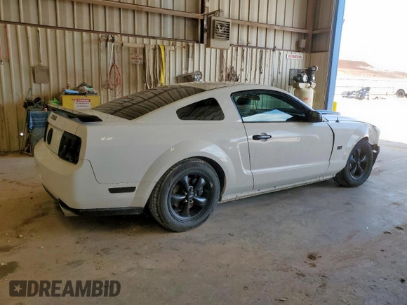 2007 Ford Mustang GT Deluxe с VIN 1ZVFT82H275239465, выставлен на аукционе Copart как лот 58575635 с пробегом 128 481 миль миль и Списание • Salvage title. История ставок и продаж доступна на DreamBid. Изображение 3.