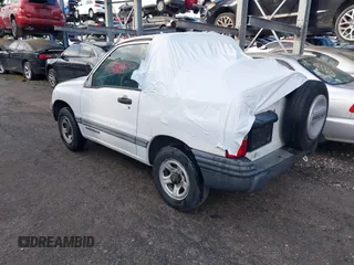 2000 Chevrolet Tracker z VIN 2CNBE18C3Y6920718, wystawiony jako IAAI lot #41566833 z przebiegiem 157 316 mil mil oraz . Historia ofert i sprzedaży dostępna na DreamBid. Obrazek 3.