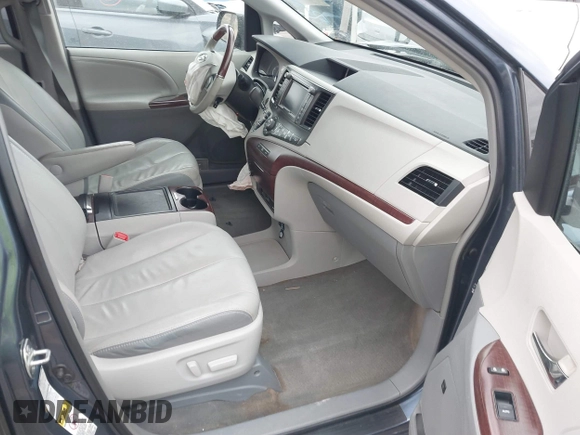 2013 Toyota Sienna XLE with VIN 5TDDK3DC1DS062849, listed as a IAAI auction lot 41510296 with 100,178 mi miles and . Bid and sale history available at DreamBid. Image 5.