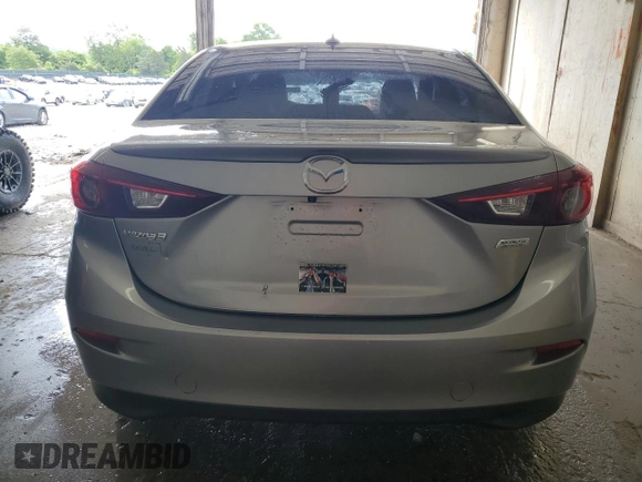 2015 Mazda 3 i Grand Touring z VIN 3MZBM1W7XFM155147, wystawiony jako Copart lot #58413555 z przebiegiem 111 318 mil mil oraz Szkoda całkowita • Salvage title. Historia ofert i sprzedaży dostępna na DreamBid. Obrazek 6.