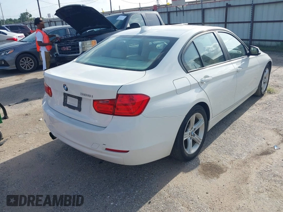 2012 BMW 3 Series 328i with VIN WBA3A5C53CF346962, listed as a IAAI auction lot 42543219 with 58,485 mi miles and . Bid and sale history available at DreamBid. Image 4.