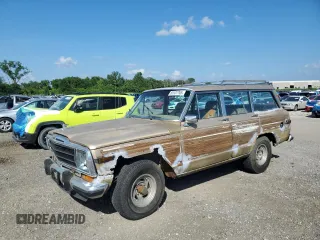 1990 Jeep Grand Wagoneer with VIN 1J4GS5875LP504606, listed as a Copart auction lot 65137765 with 204,729 mi miles and Clean title. Bid and sale history available at DreamBid. Image 1.