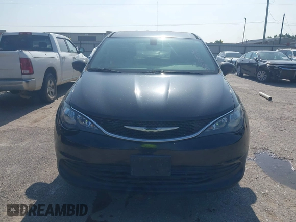 2017 Chrysler Pacifica Touring with VIN 2C4RC1DG6HR509717, listed as a IAAI auction lot 42228096 with 86,956 mi miles and . Bid and sale history available at DreamBid. Image 12.