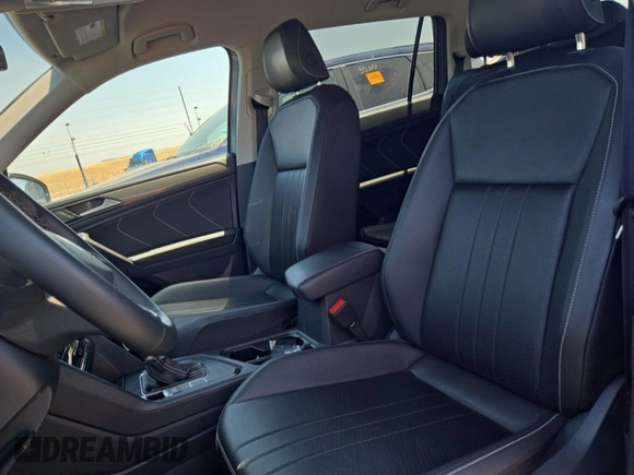 2024 Volkswagen Tiguan SE with VIN 3VV3B7AX1RM108036, listed as a IAAI auction lot 42796415 with 37,805 mi miles and . Bid and sale history available at DreamBid. Image 50.