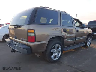 2004 Chevrolet Tahoe LT with VIN 1GNEC13ZX4R235169, listed as a IAAI auction lot 40823137 with 204,957 mi miles. Bid and sale history available at carsss.com. Image 4.