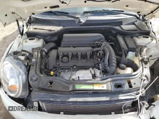 2010 MINI Convertible S with VIN WMWMS3C51ATZ85166, listed as a Copart auction lot 52907775 with 90,090 mi miles and Salvage title. Bid and sale history available at DreamBid. Image 12.