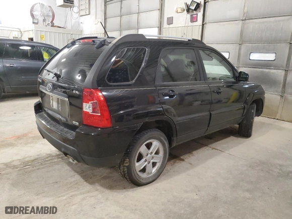 2009 Kia Sportage LX with VIN KNDJF723197638667, listed as a Copart auction lot 82926774 with 196,752 mi miles and Clean Title. Bid and sale history available at carsss.com. Image 3.