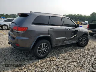 2017 Jeep Grand Cherokee Trailhawk with VIN 1C4RJFLT3HC614449, listed as a Copart auction lot 58559335 with 153,051 mi miles and Salvage title. Bid and sale history available at DreamBid. Image 3.