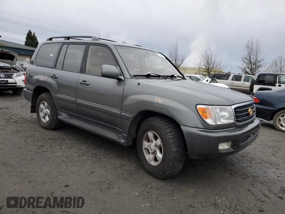 2000 Toyota Land Cruiser with VIN JT3HT05J5Y0114569, listed as a Copart auction lot 86542484 with 256,816 mi miles and Salvage Title. Bid and sale history available at carsss.com. Image 4.