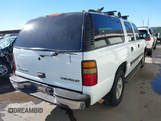 2005 Chevrolet Suburban LT with VIN 1GNEC16Z55J106137, listed as a IAAI auction lot 41235825 with 231,042 mi miles and . Bid and sale history available at DreamBid. Image 4.